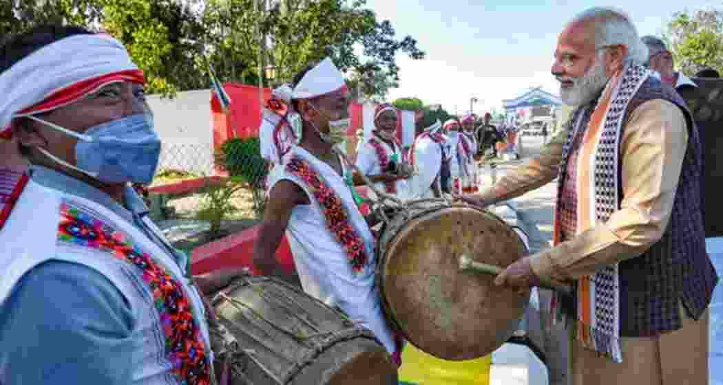 PM Modi being welcomed by folk artistes on his arrival in Imphal, Manipur, in 2022. PM Modi being welcomed by folk artistes on his arrival in Imphal, Manipur, in 2022.