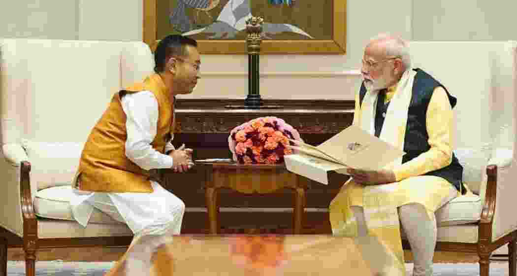 Sikkim Chief Minister Prem Singh Tamang meets Prime Minister Narendra Modi in New Delhi on August 26, 2024, to extend a formal invitation for the 50th Statehood Day celebrations. Sikkim Chief Minister Prem Singh Tamang meets Prime Minister Narendra Modi in New Delhi on August 26, 2024, to extend a formal invitation for the 50th Statehood Day celebrations.