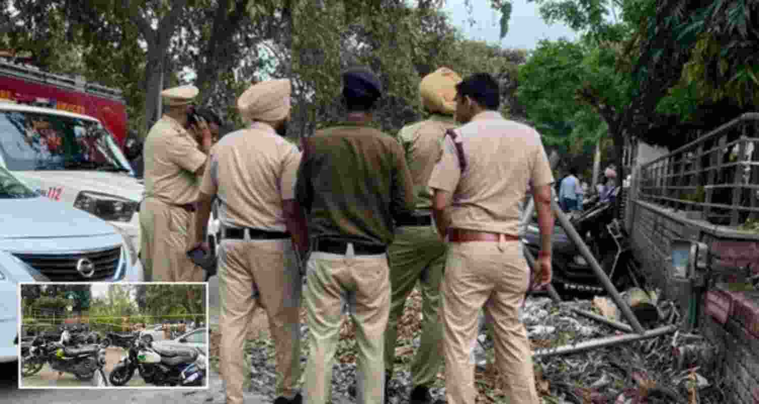 Police investigate the area after a minor explosion outside the Punjab BJP office in Chandigarh. Police investigate the area after a minor explosion outside the Punjab BJP office in Chandigarh.