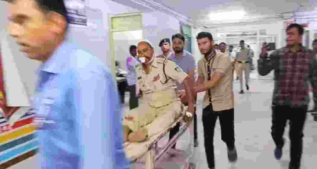 Visuals from the hospital show injured police personnel being carried on a stretcher for medical treatment after a violent mob attack in Mauganj district, Madhya Pradesh. Visuals from the hospital show injured police personnel being carried on a stretcher for medical treatment after a violent mob attack in Mauganj district, Madhya Pradesh.