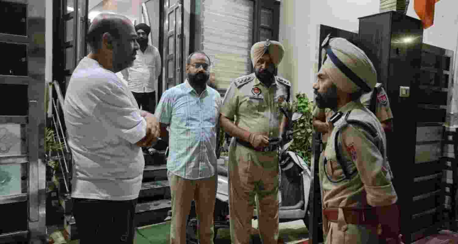 Police personnel outside the clinic targeted in a petrol bomb blast in Bathinda on Monday night. Police personnel outside the clinic targeted in a petrol bomb blast in Bathinda on Monday night.