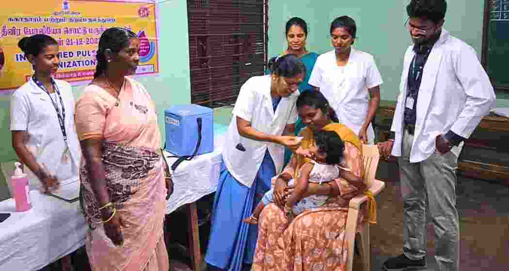 A child being administered polio drops during the Pulse Polio drive in Andhra Pradesh. A child being administered polio drops during the Pulse Polio drive in Andhra Pradesh.