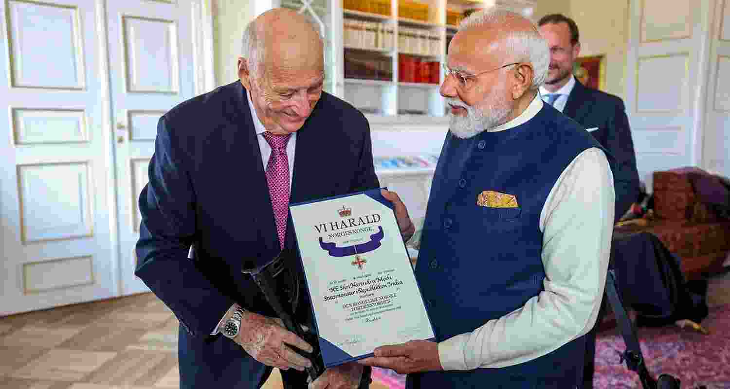 Prime Minister Narendra Modi receives Norway's top honour, the Grand Cross of the Royal Norwegian Order of Merit, during a ceremony in Oslo, Norway. Prime Minister Narendra Modi receives Norway's top honour, the Grand Cross of the Royal Norwegian Order of Merit, during a ceremony in Oslo, Norway.