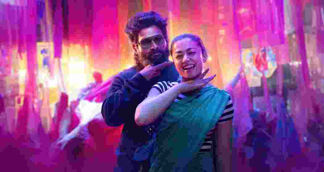 Allu Arjun and Rashmika Mandanna strike a pose during a vibrant dance shoot for Pushpa 2: The Rule, showcasing their dynamic chemistry. Allu Arjun and Rashmika Mandanna strike a pose during a vibrant dance shoot for Pushpa 2: The Rule, showcasing their dynamic chemistry.