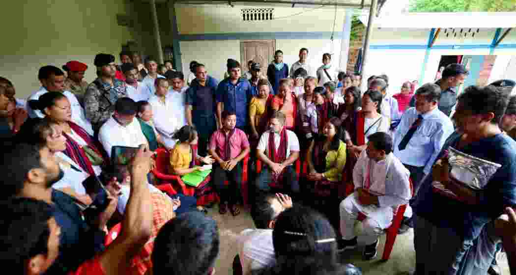 Leader of Opposition Rahul Gandhi engages with flood victims during a visit to a relief camp in Fulertal, Cachar district, Assam. Leader of Opposition Rahul Gandhi engages with flood victims during a visit to a relief camp in Fulertal, Cachar district, Assam.