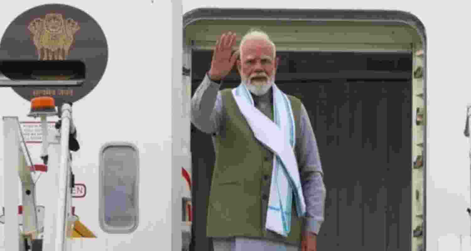 PM Modi waits at Airport to avoid inconvenience to NEET aspirants PM Modi waits at Airport to avoid inconvenience to NEET aspirants