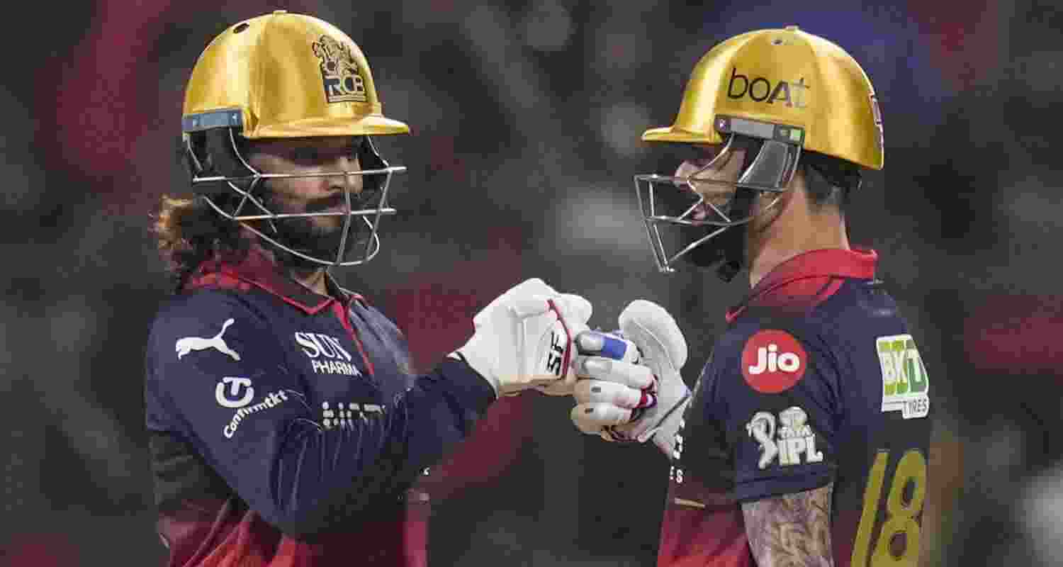Royal Challengers Bengaluru's captain Rajat Patidar, left, and Virat Kohli during the Indian Premier League (IPL) 2026 T20 cricket match between Royal Challengers Bengaluru and Lucknow Super Giants, at M Chinnaswamy Stadium in Bengaluru, Karnataka, Wednesday, April 15, 2026. Royal Challengers Bengaluru's captain Rajat Patidar, left, and Virat Kohli during the Indian Premier League (IPL) 2026 T20 cricket match between Royal Challengers Bengaluru and Lucknow Super Giants, at M Chinnaswamy Stadium in Bengaluru, Karnataka, Wednesday, April 15, 2026.
