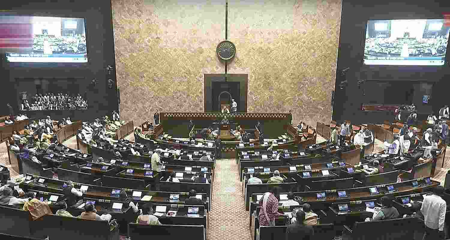 Opposition members walk out of the Rajya Sabha during the Budget session of Parliament, in New Delhi, Thursday. Opposition members walk out of the Rajya Sabha during the Budget session of Parliament, in New Delhi, Thursday.