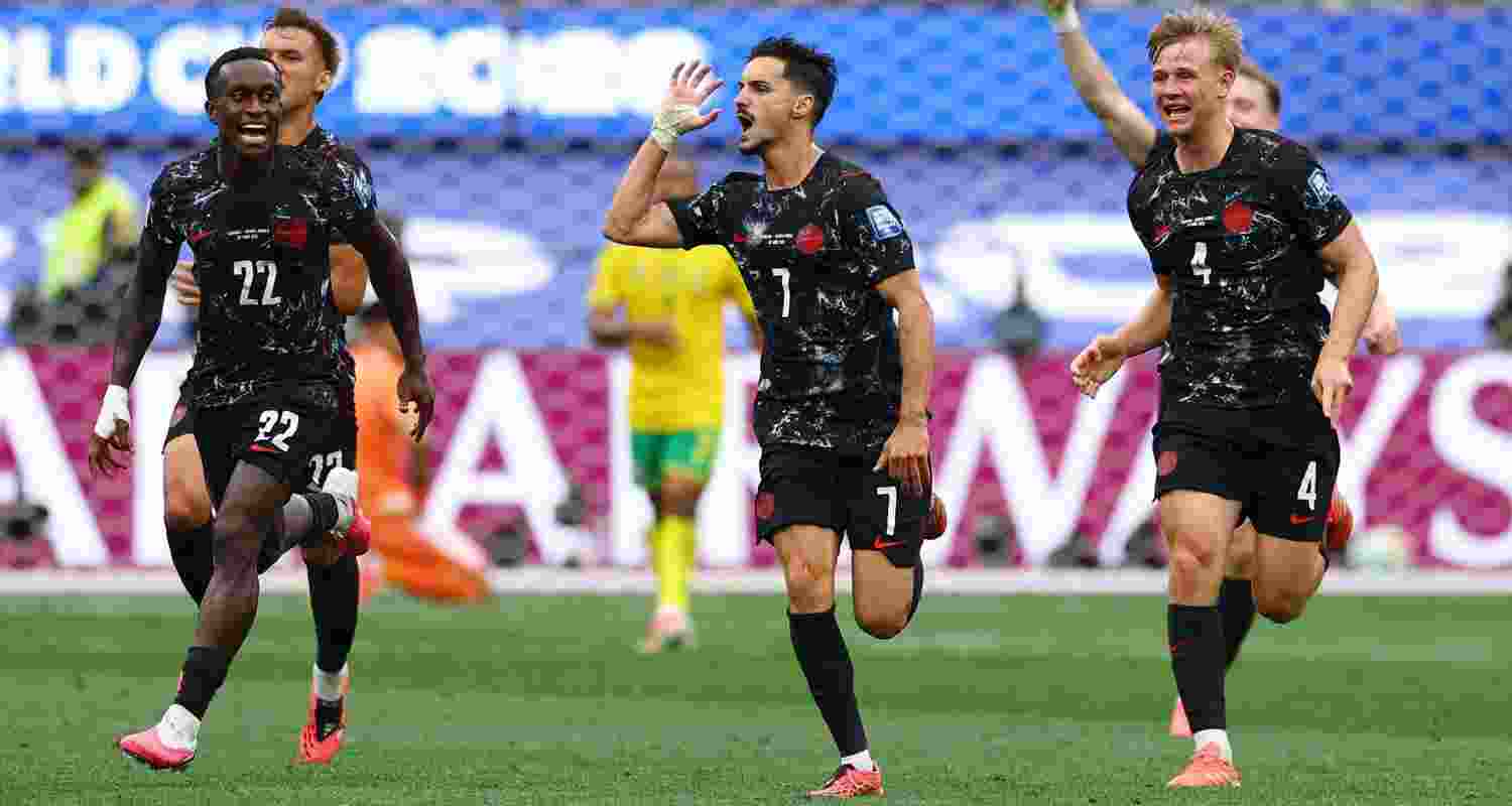 Canadian players enjoying their historic triumph at the FIFA World Cup. Canadian players enjoying their historic triumph at the FIFA World Cup.