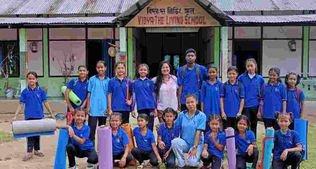 Students of Vidya: The Living School in Assam pose for a photograph after a yoga session on the campus, which provides education and life skills training to children from marginalised communities. Students of Vidya: The Living School in Assam pose for a photograph after a yoga session on the campus, which provides education and life skills training to children from marginalised communities.