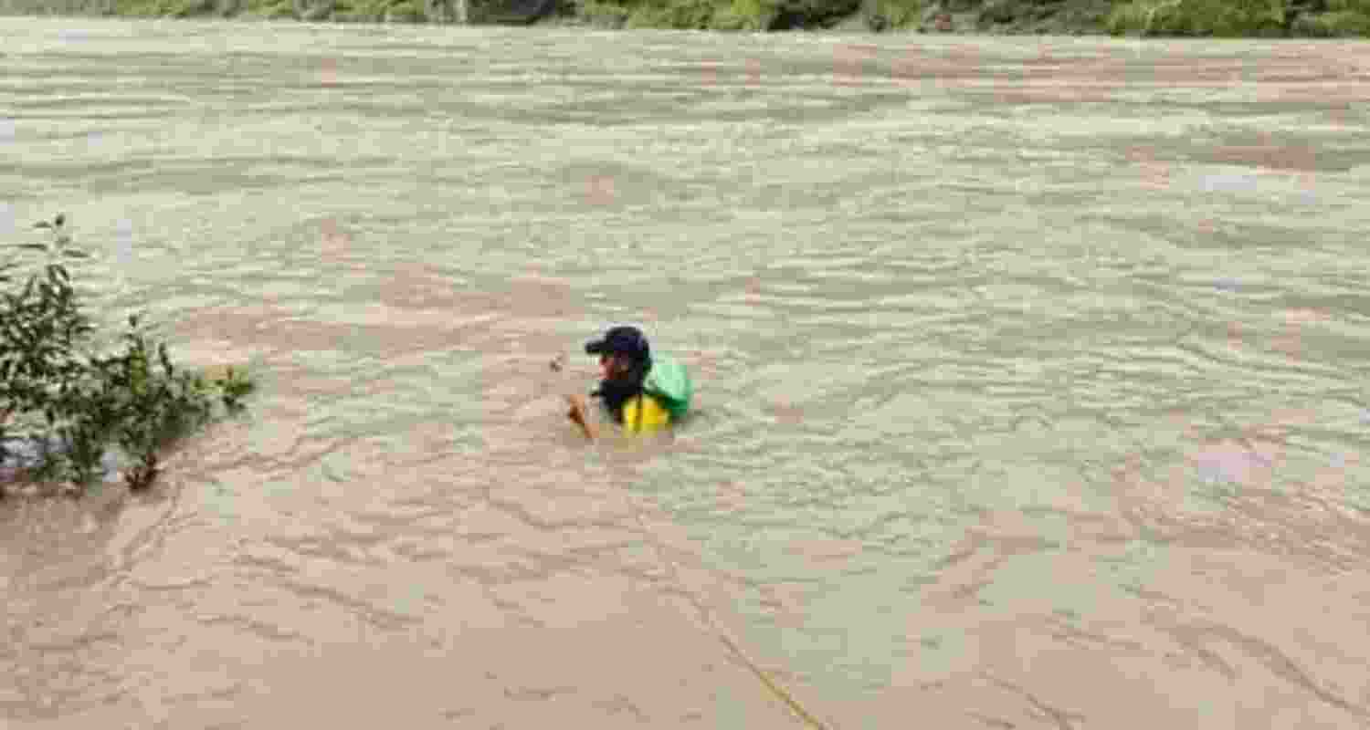 SDRF personnel continue search for the mother and daughter swept away while bathing in the Ganga at a Rishikesh ghat. SDRF personnel continue search for the mother and daughter swept away while bathing in the Ganga at a Rishikesh ghat.