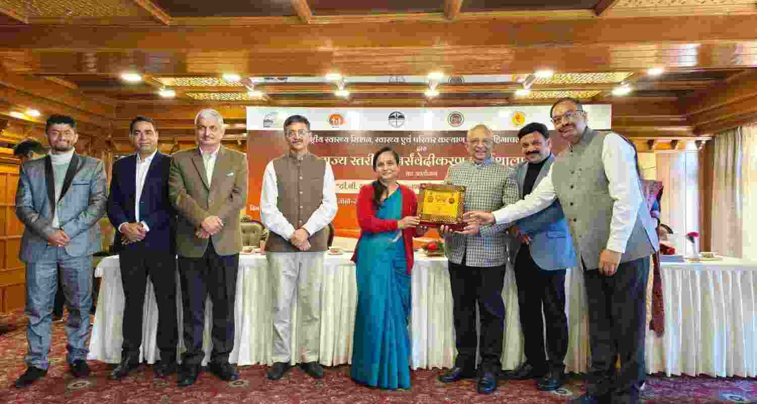 Secretary, Health & Family Welfare, Government of Himachal Pradesh, M Sudha Devi, presents the award to Kangra health officers for the best advocacy, communication, and outreach campaign for TB elimination. Secretary, Health & Family Welfare, Government of Himachal Pradesh, M Sudha Devi, presents the award to Kangra health officers for the best advocacy, communication, and outreach campaign for TB elimination.