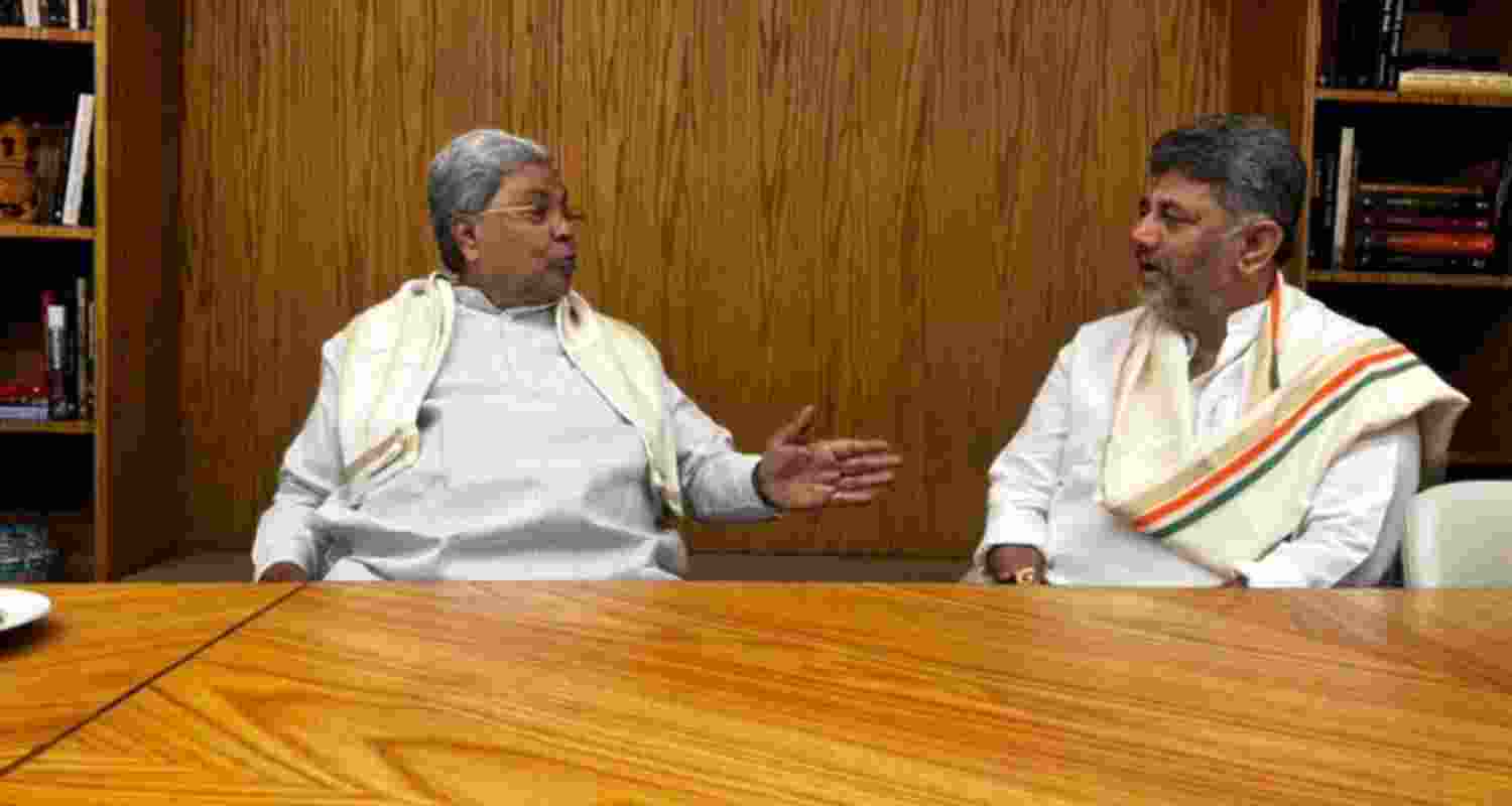Karnataka Congress leaders Siddaramaiah and DK Shivakumar. Karnataka Congress leaders Siddaramaiah and DK Shivakumar.