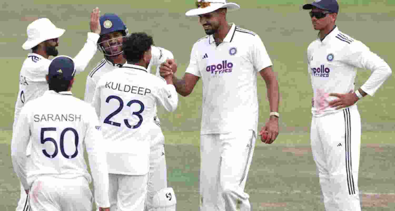 Teammates congratulating spinner Kuldeep Yadav after he found his rhythm and bagged two wickets. Teammates congratulating spinner Kuldeep Yadav after he found his rhythm and bagged two wickets.