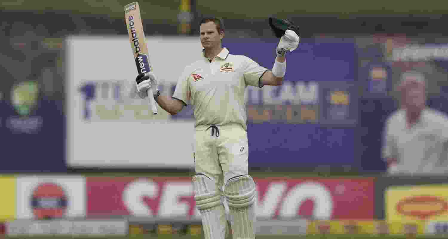 Steve Smith celebrates a century on the same day after completing 10,000 runs in Test cricket. Steve Smith celebrates a century on the same day after completing 10,000 runs in Test cricket.
