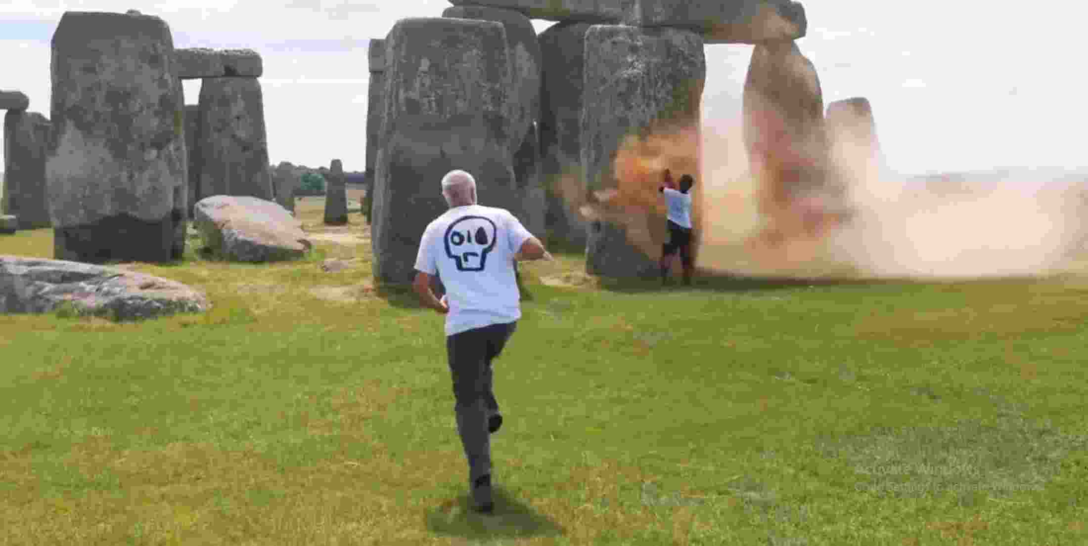The campaigners were caught on video rushing to the stones and spraying powder paint even as visitors ran up to them shouting “no” and “stop,” before pulling them away. The campaigners were caught on video rushing to the stones and spraying powder paint even as visitors ran up to them shouting “no” and “stop,” before pulling them away.