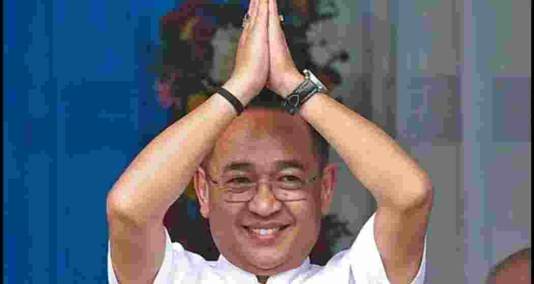 Sikkim CM Prem Singh Tamang greeting the crowd after concluding his oath taking ceremony in Gangtok, Sikkim on Monday. Sikkim CM Prem Singh Tamang greeting the crowd after concluding his oath taking ceremony in Gangtok, Sikkim on Monday.