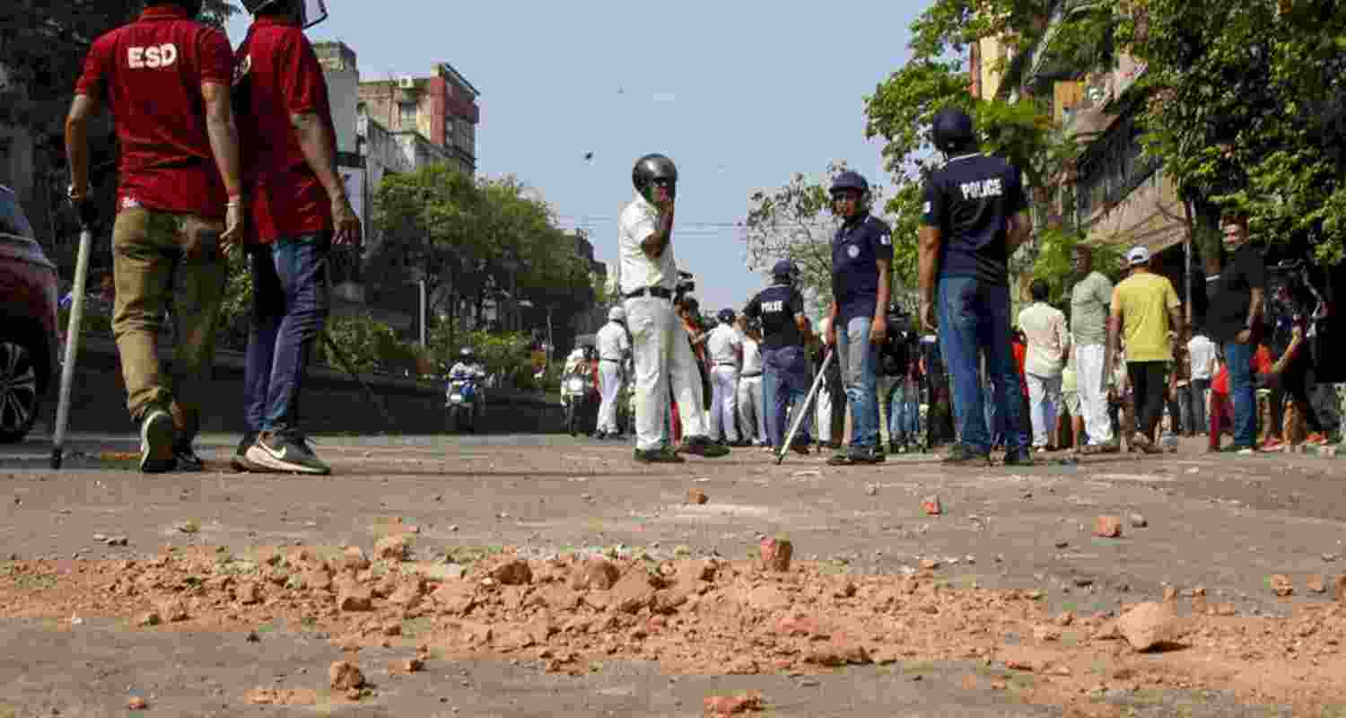 Brick debris lies scattered on ground after clashes broke out between TMC and BJP supporters, barely half an hour before Prime Minister Narendra Modi's rally at the Brigade Parade Ground, in Kolkata, Saturday, March 14, 2026. Brick debris lies scattered on ground after clashes broke out between TMC and BJP supporters, barely half an hour before Prime Minister Narendra Modi's rally at the Brigade Parade Ground, in Kolkata, Saturday, March 14, 2026.