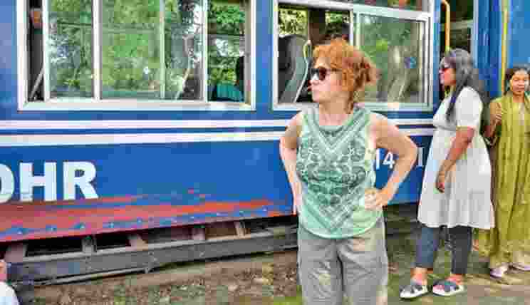 Joie Creswell pauses to soak in the charm of Darjeeling hills during her nostalgic toy train journey in West Bengal. Joie Creswell pauses to soak in the charm of Darjeeling hills during her nostalgic toy train journey in West Bengal.
