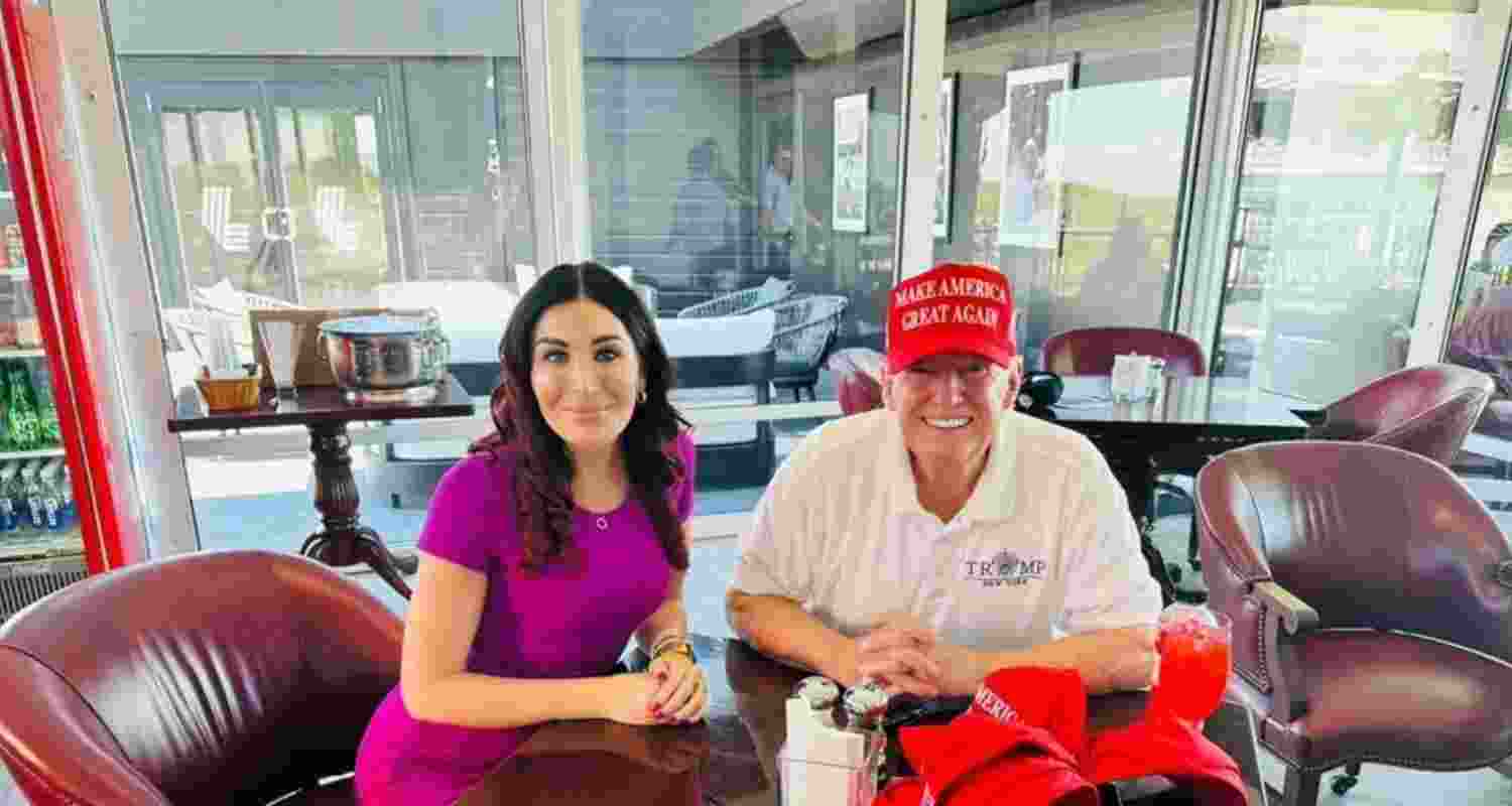 Donald Trump with Laura Loomer. Donald Trump with Laura Loomer.