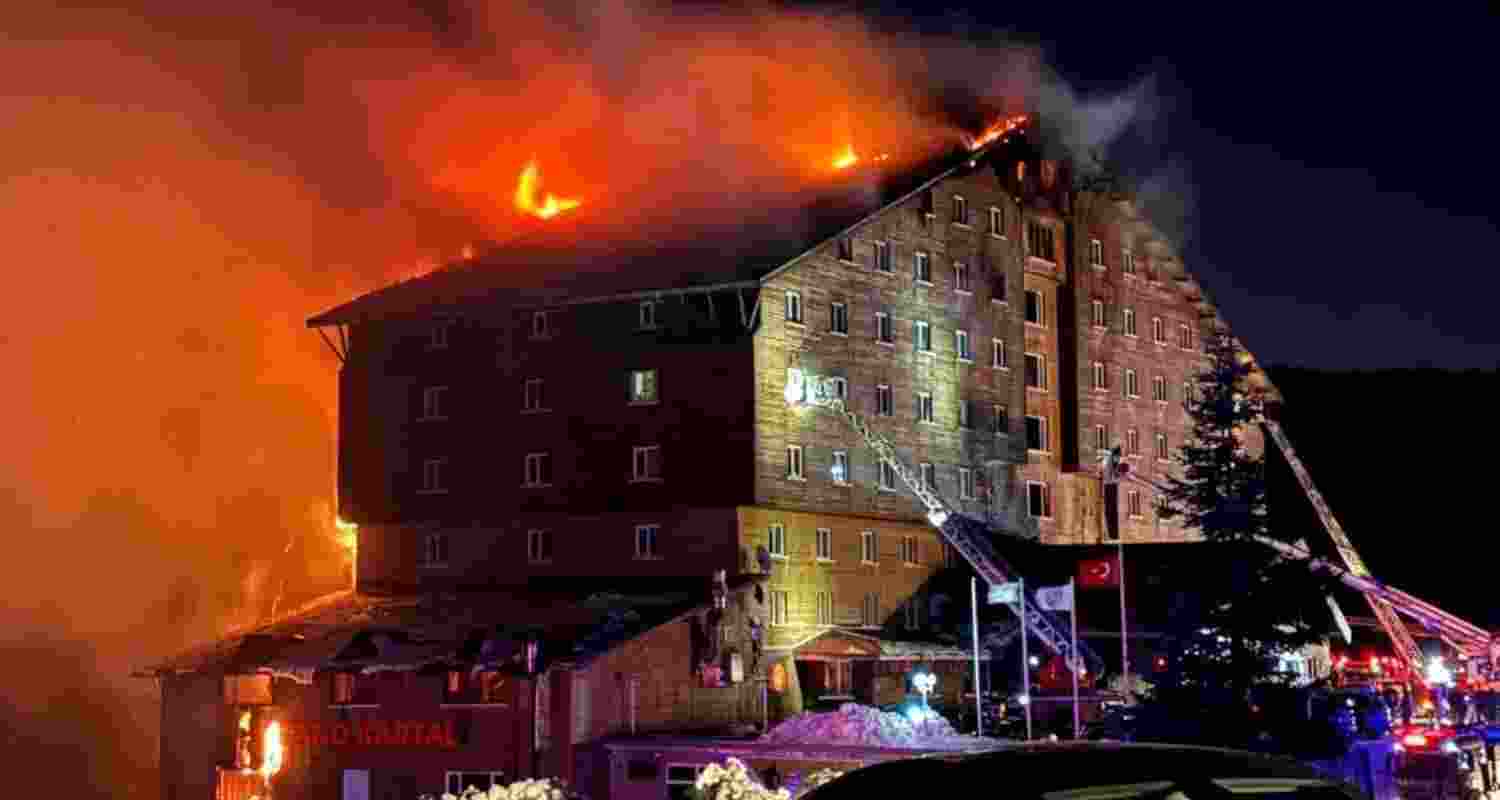 Flames rise from the Grand Kartal hotel. Image via X. Flames rise from the Grand Kartal hotel. Image via X.