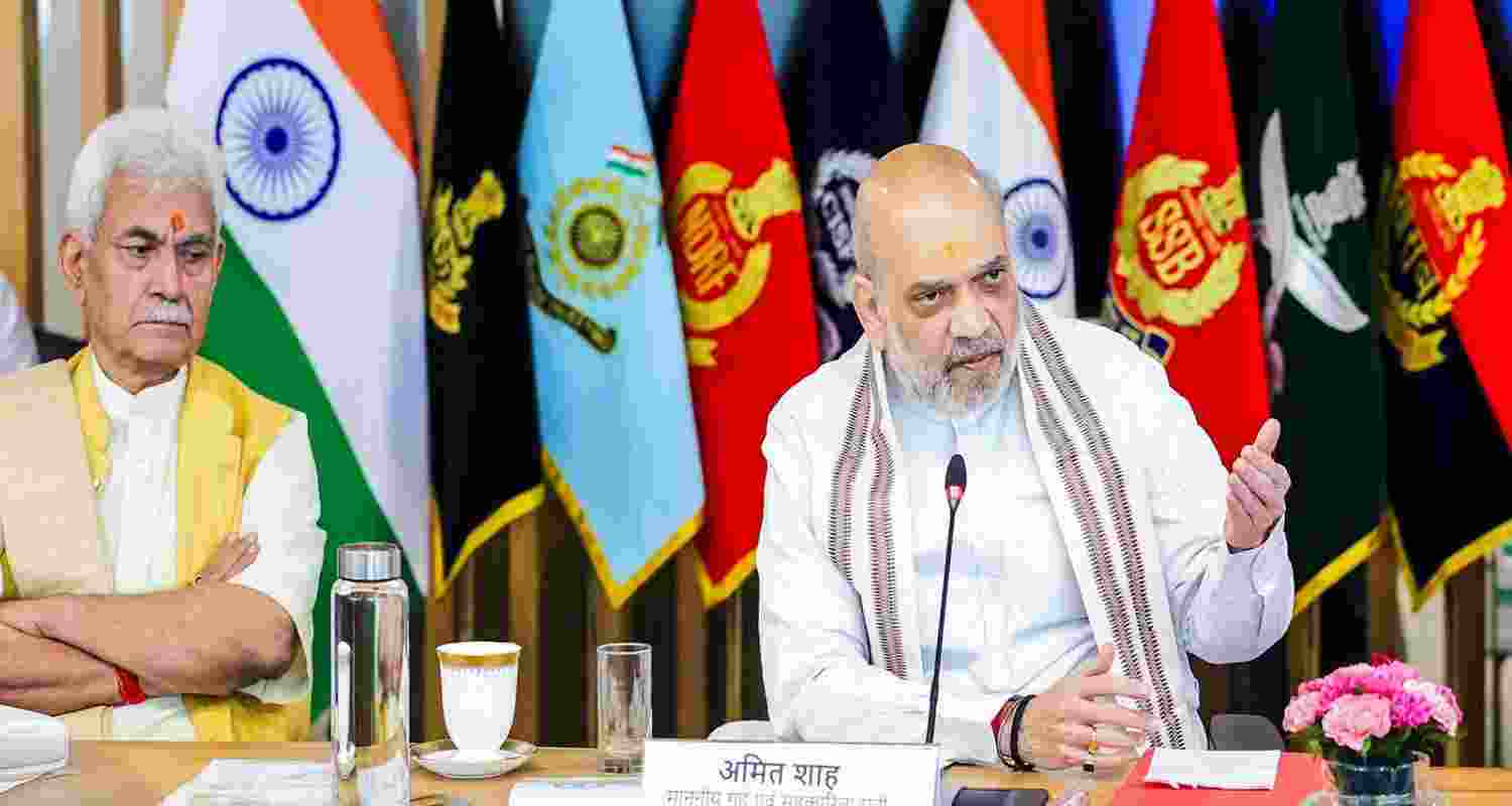 Union HM Amit Shah, along with J-K LG Manoj Sinha in security meeting (File Photo). Union HM Amit Shah, along with J-K LG Manoj Sinha in security meeting (File Photo).