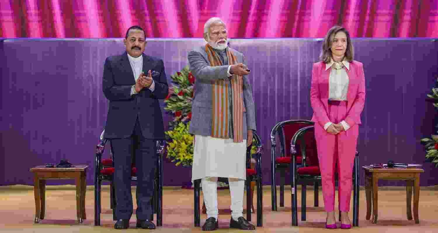 PM Modi unveils IMD Vision 2047 and commemorative coin. PM Modi unveils IMD Vision 2047 and commemorative coin.