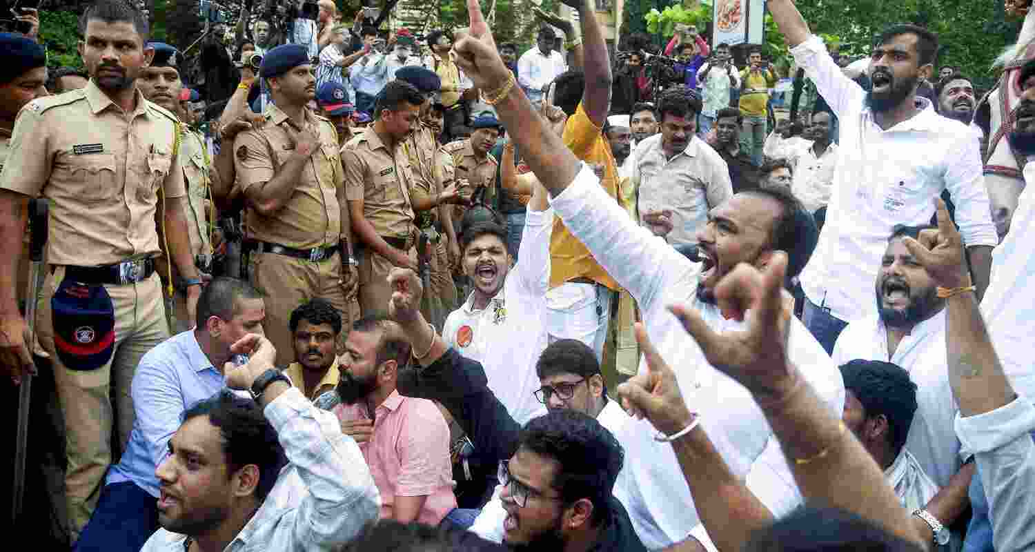 Protesters slam BJP over Marathi identity issue. Protesters slam BJP over Marathi identity issue.