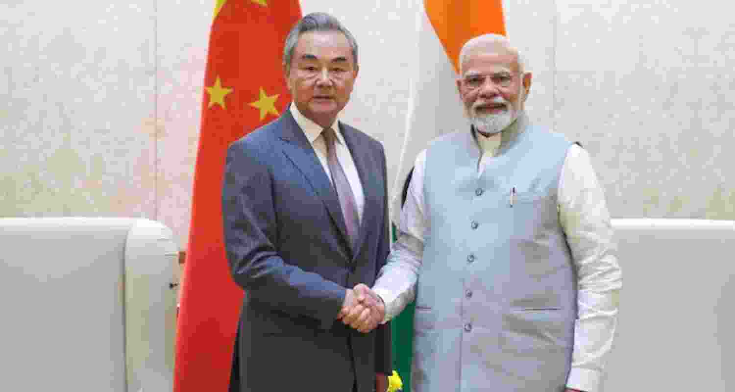 PM Modi meets Chinese FM Wang Yi in Delhi ahead of SCO summit. PM Modi meets Chinese FM Wang Yi in Delhi ahead of SCO summit.