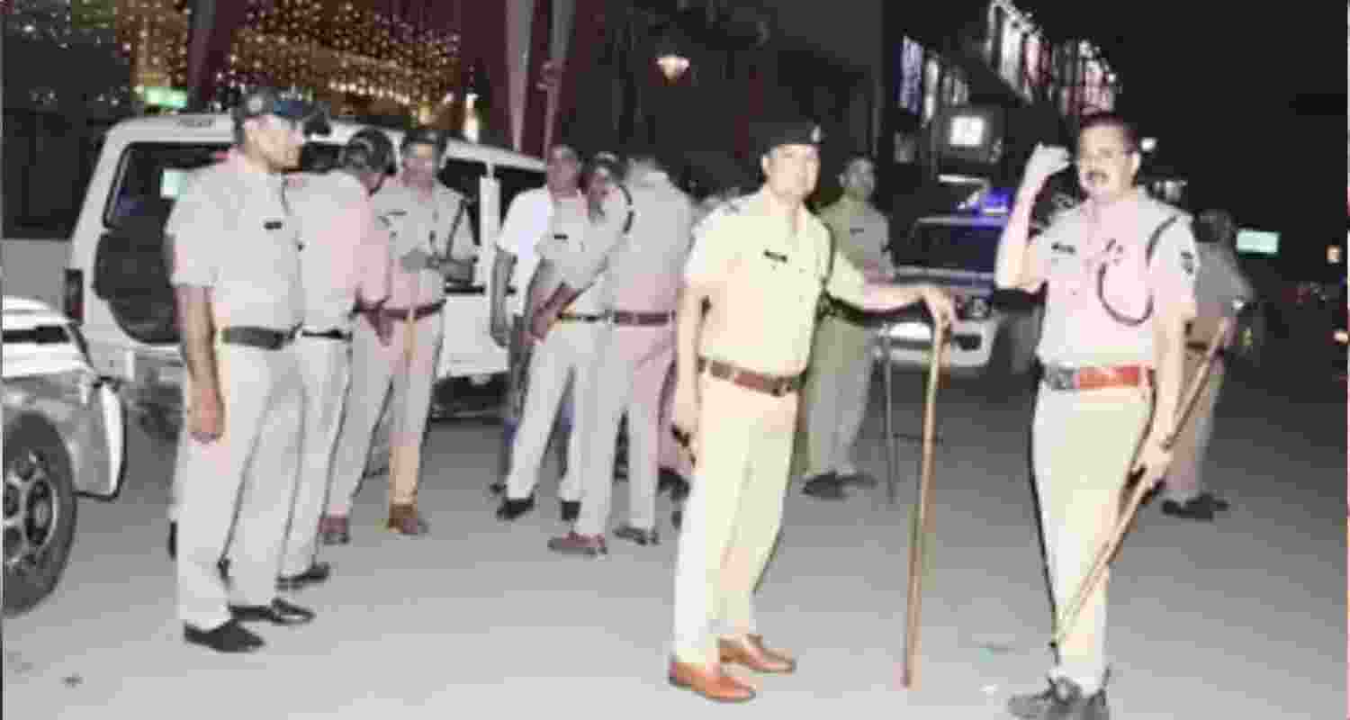 Police personnel carry out flag march to maintain peace. Police personnel carry out flag march to maintain peace.