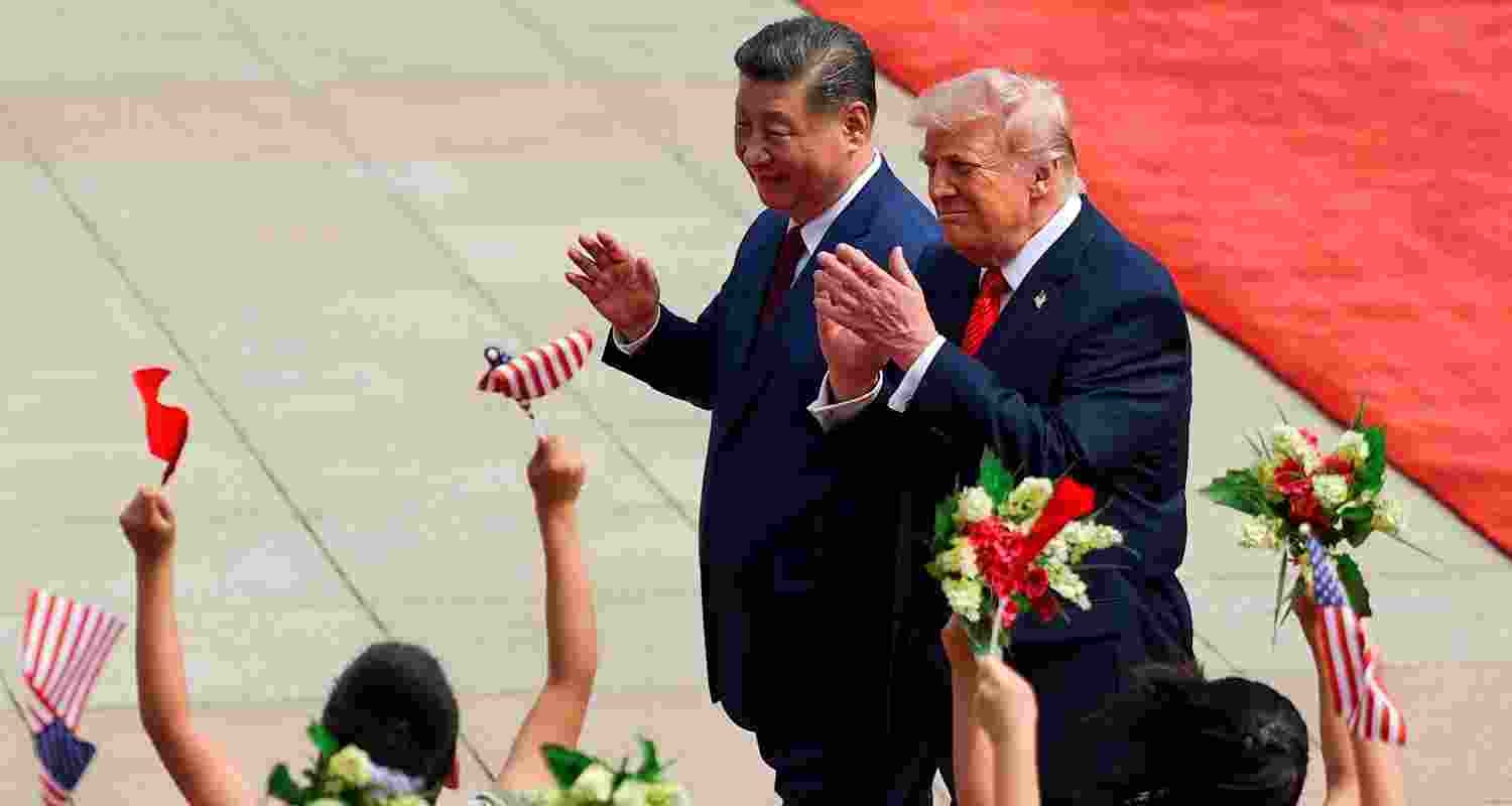 US President Donald Trump and Chinese President Xi Jinping attend a welcome ceremony at the Great Hall of the People in Beijing. US President Donald Trump and Chinese President Xi Jinping attend a welcome ceremony at the Great Hall of the People in Beijing.