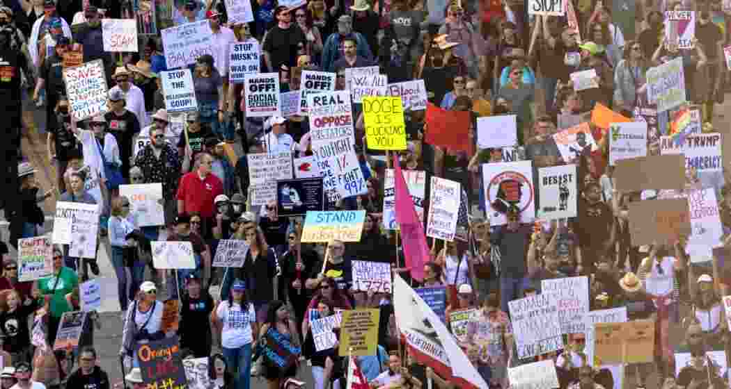 Protesters rally on the National Mall in Washington against President Donald Trump’s policies, with similar demonstrations taking place across US cities and European capitals. Protesters rally on the National Mall in Washington against President Donald Trump’s policies, with similar demonstrations taking place across US cities and European capitals.