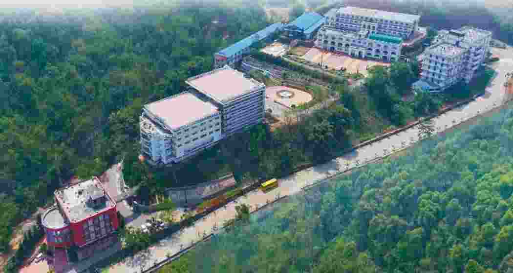 An aerial view of the USTM campus spread across dense forest in Meghalaya’s Ri-Bhoi district. An aerial view of the USTM campus spread across dense forest in Meghalaya’s Ri-Bhoi district.