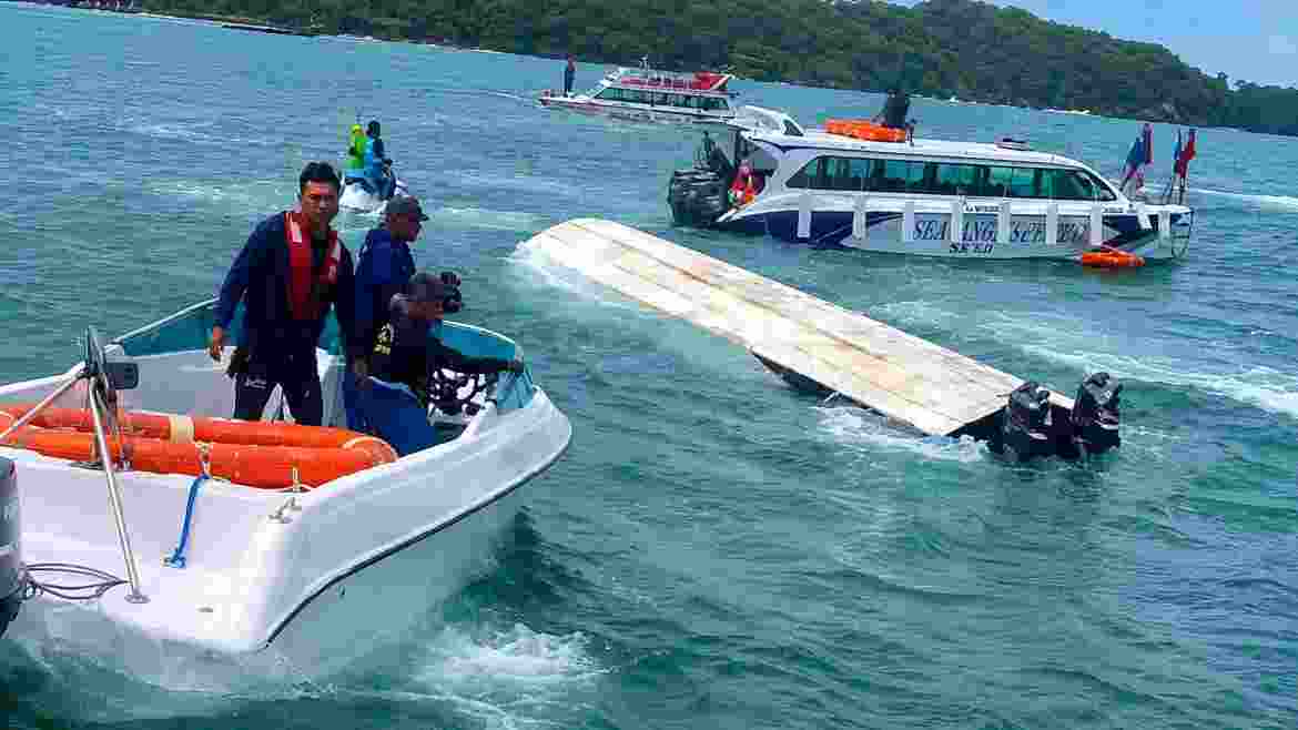 Rescue personnel carry out search and rescue operations after a tourist boat carrying Indian nationals capsized near Vietnam's Phu Quoc Island on Saturday, leaving at least 15 people dead. Rescue personnel carry out search and rescue operations after a tourist boat carrying Indian nationals capsized near Vietnam's Phu Quoc Island on Saturday, leaving at least 15 people dead.
