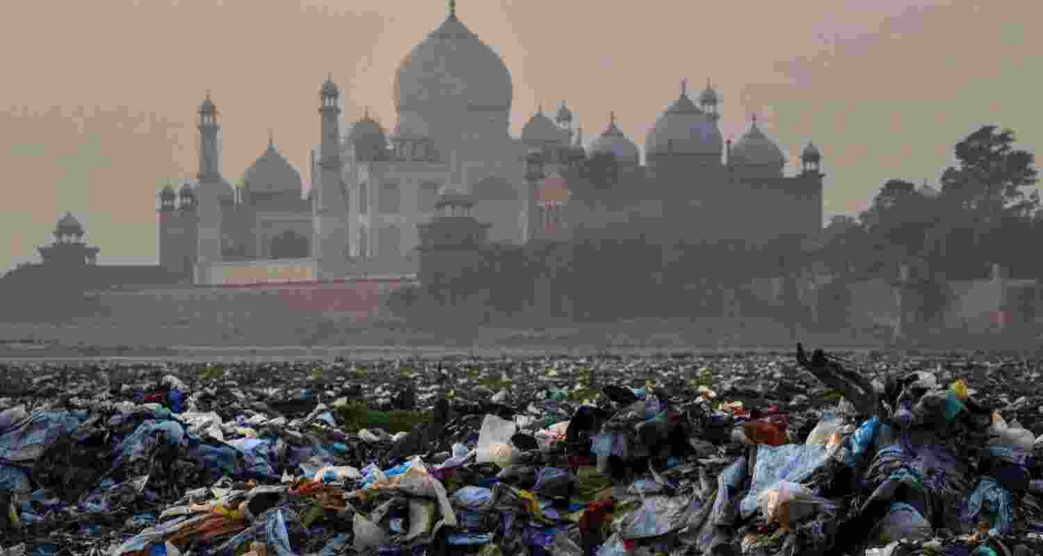 Piles of trash accumulated in the polluted Yamuna waters near the iconic Taj Mahal in Agra, Uttar Pradesh. Piles of trash accumulated in the polluted Yamuna waters near the iconic Taj Mahal in Agra, Uttar Pradesh.