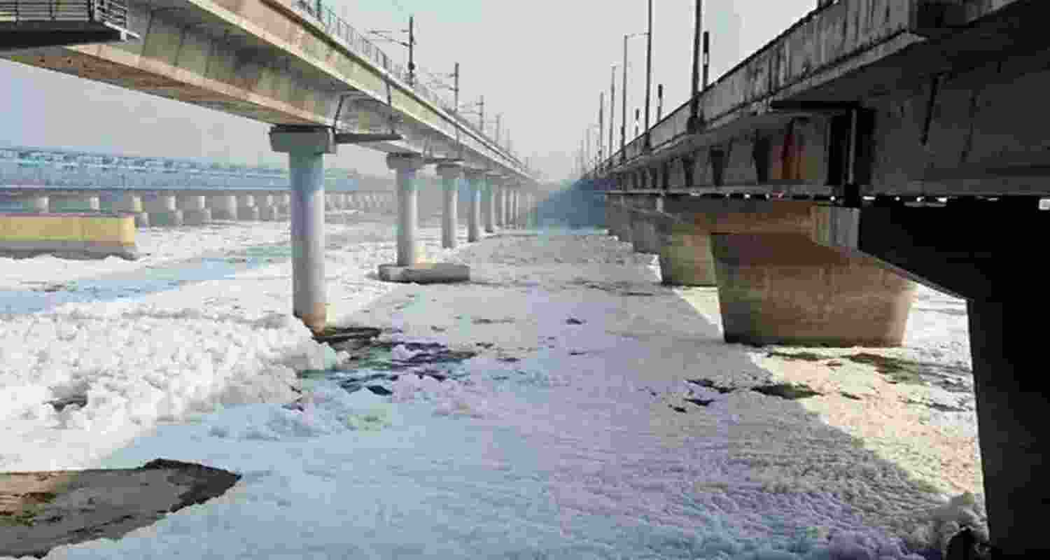 Froth forms over toxic water in the Yamuna river. Froth forms over toxic water in the Yamuna river.